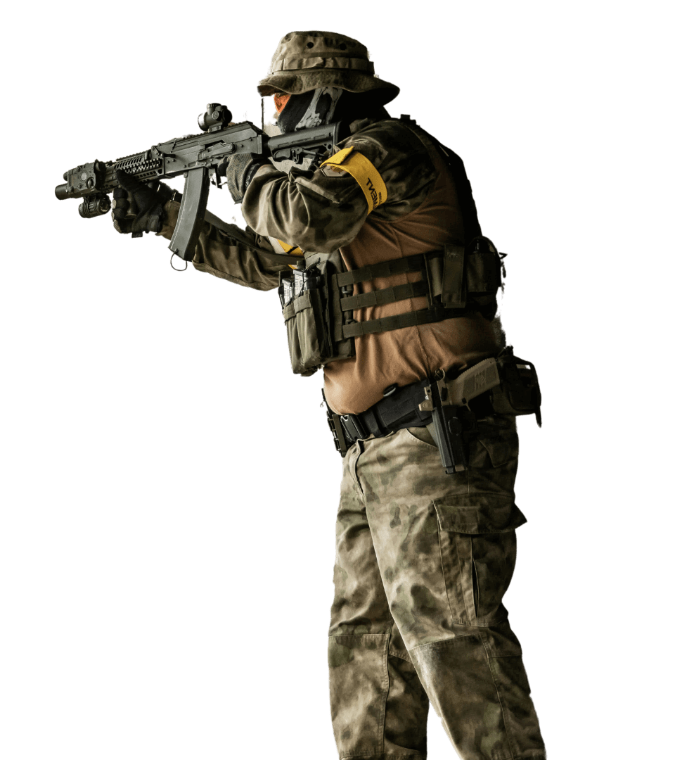 Man in Tactical gear Holding an Airsoft gun